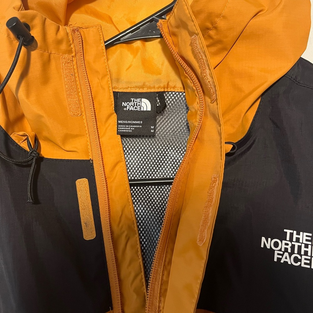 The North Face Vibrant Orange and Black Outdoor Jacket